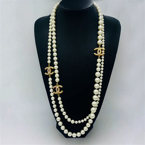 replica chanel black pearl necklace|faux Chanel long pearl necklace.